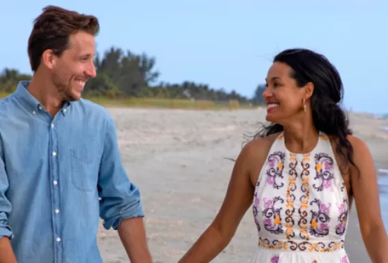 Couple walking on beach